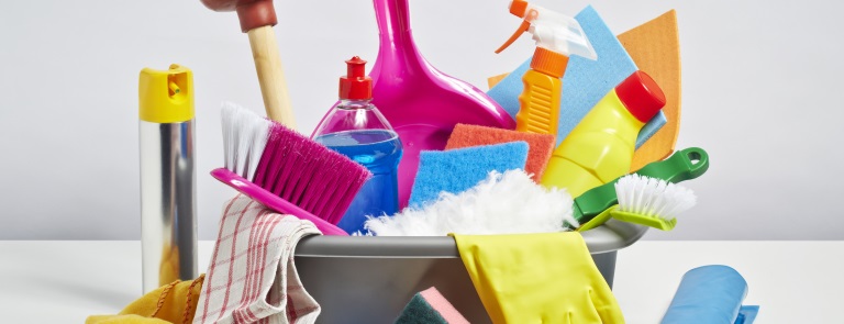 House cleaning products pile on white background